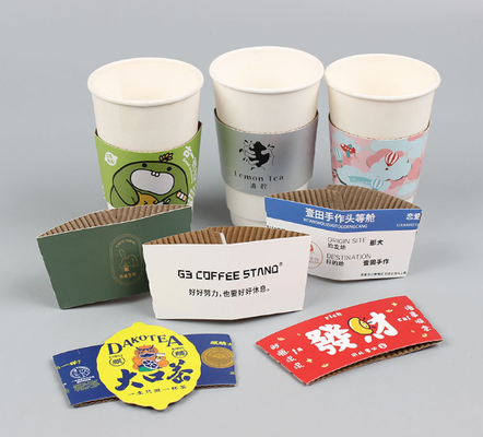 अच्छी कीमत 2 मिमी डिस्पोजेबल कस्टम कॉफी कप स्लीव्स नालीदार कागज गर्मी इन्सुलेशन बायोडिग्रेडेबल ऑनलाइन